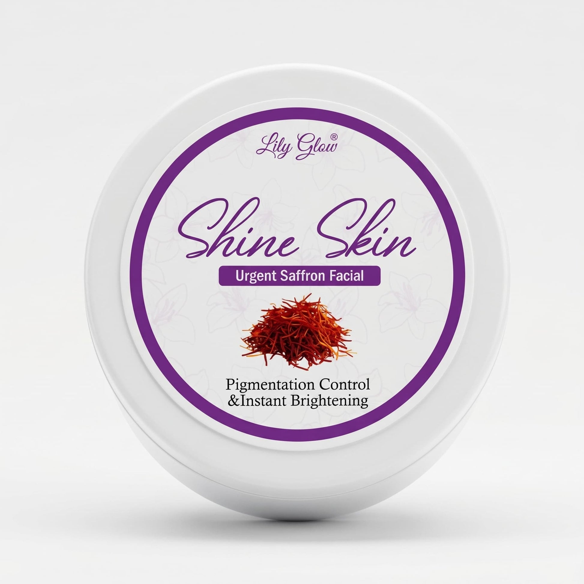 Round white jar of Lily Glow Shine Skin Urgent Saffron Facial with a purple circular border and an illustration of a pile of raw saffron threads.